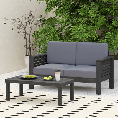 Ensemble de causeuse et table basse d'extérieur en bois d'acacia avec coussins, gris foncé