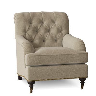 Fauteuil à coussin en duvet capitonné Devan