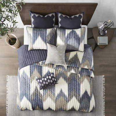 Couette 3 pièces en coton bleu marine, motif imprimé, revers uni, taies d'oreiller passepoilées, confortable et élégante.