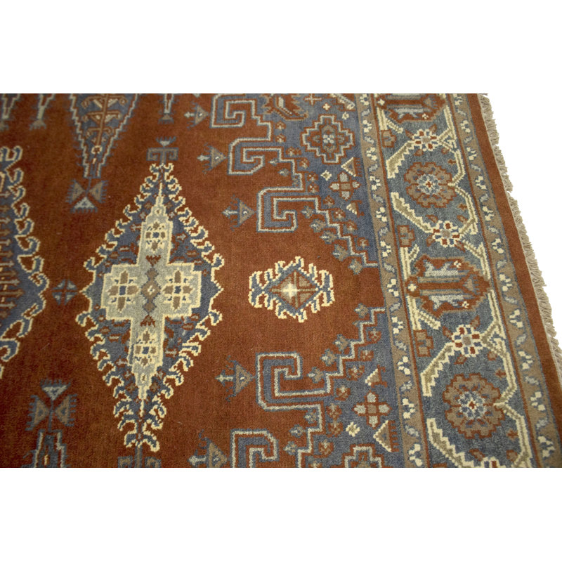 Tapis géométrique en laine noué à la main orange et rouge