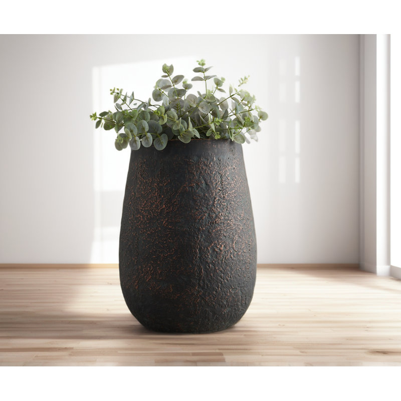 Grande jardinière en béton patiné