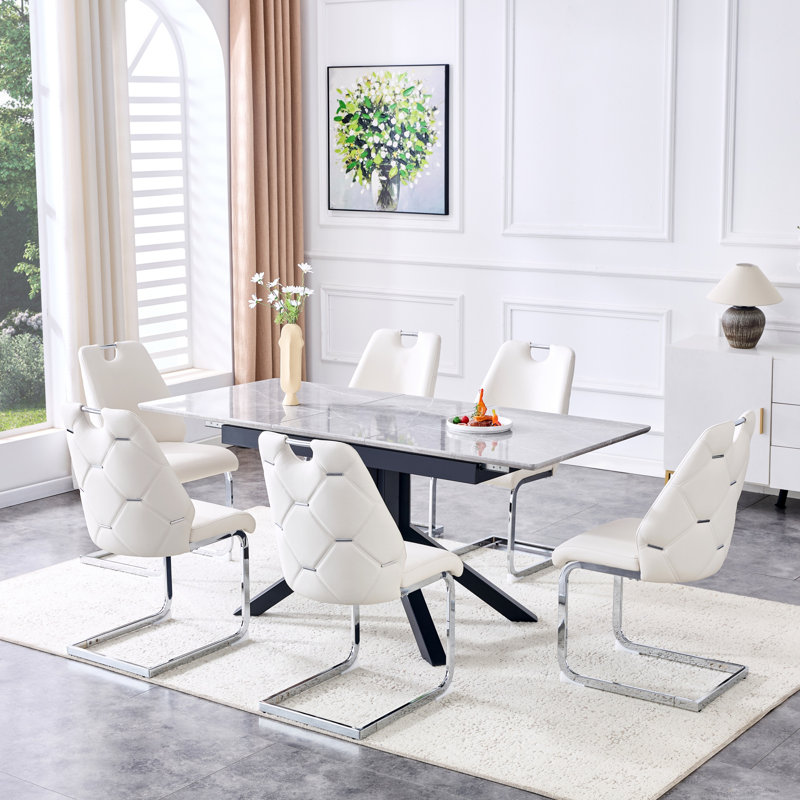 Table de salle à manger contemporaine en bois aggloméré extensible et 4 chaises à dossier en similicuir, parfaites pour les réunions de famille modernes et peu encombrantes