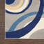 Tapis à motif géométrique gris / bleu Lindall-390377813