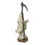 Statuette de la Sainte Mort avec faux et boule de cristal, vêtue d'une robe en billets de banque.