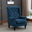 Fauteuil d'appoint capitonné à dossier haut