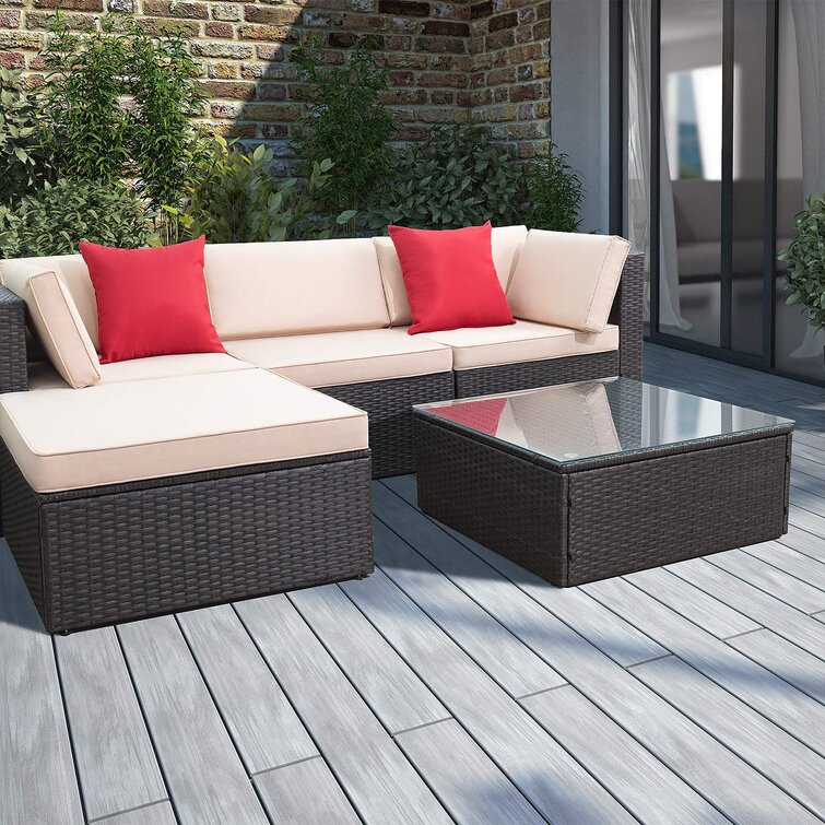 https://assets.wfcdn.com/im/69295594/resize-h755-w755%5Ecompr-r85/8533/85332923/Huang+4+-+Person+Outdoor+Seating+Group+with+Cushions.jpg