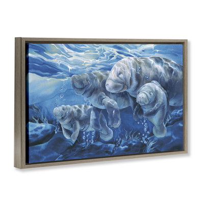 Cadre flottant pour famille de lamantins sous l'eau, design par Jody Bergsma
