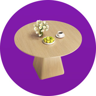 Round light oak dining table with a solid pedestal base, styled with a vase of white flowers, a plate of green apples, and a cup of coffee.