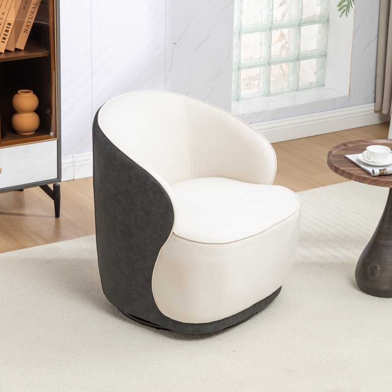 Fauteuil demi-tonneau pivotant en velours Stith,  Velours noir / beige