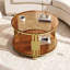 Table basse moderne en verre brun avec base tambour doré et tablette inférieure