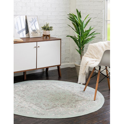 Tapis traditionnel Marciel couleur mousse