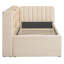 Lit de jour rembourré en velours beige avec lit gigogne escamotable, rangement et prise de courant pour un appareil pratique-313118431