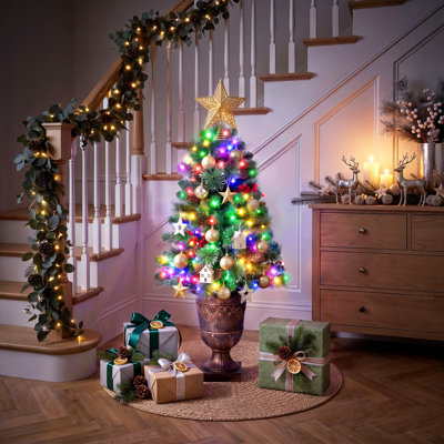 Arbre de Noël artificiel illuminé 4 pi / 5 pi dans un pot à fleurs en forme d'urne - Arbre de Noël artificiel en pot avec pommes de pin, baies rouges et 8 lumières DEL pour l'entrée