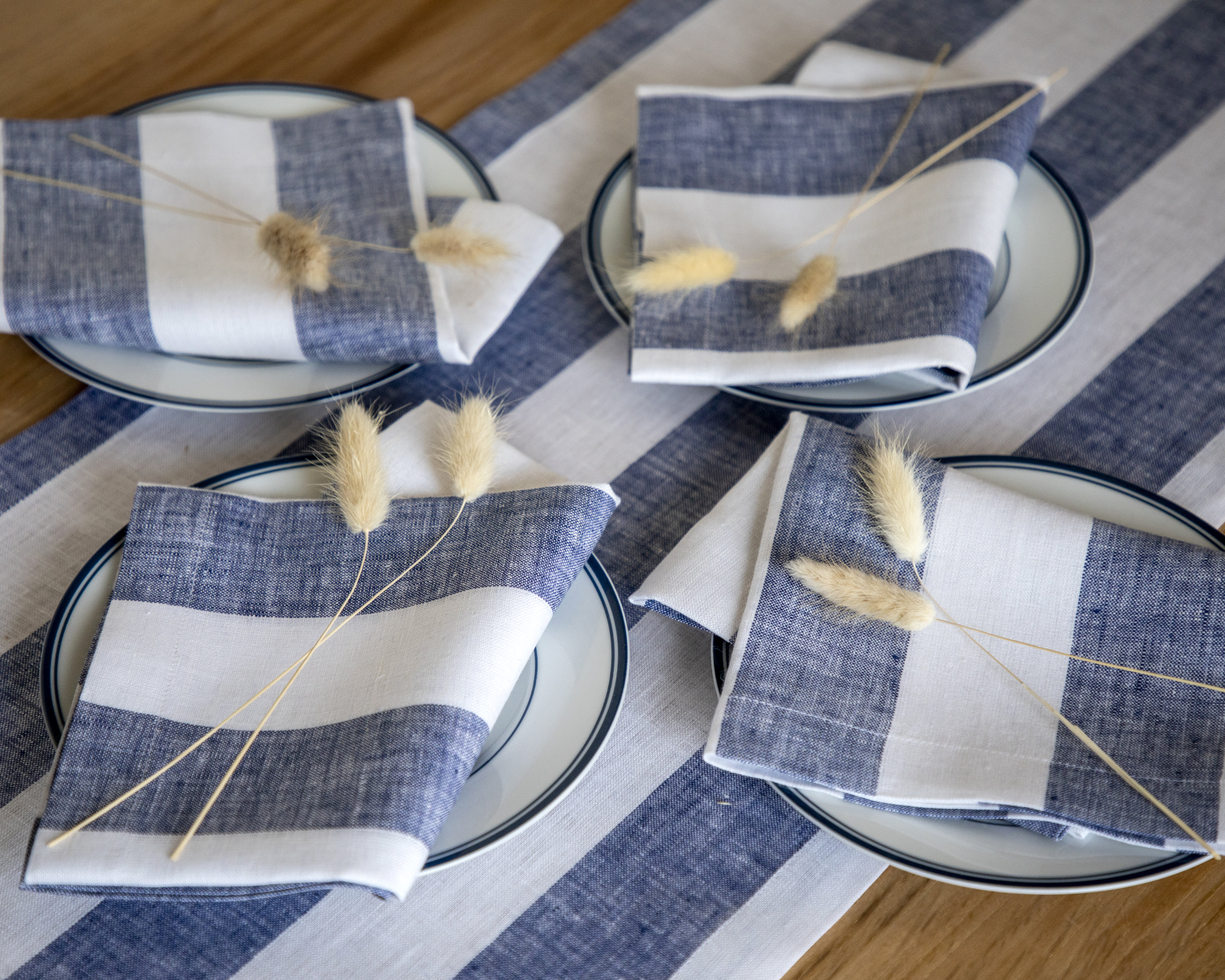 https://assets.wfcdn.com/im/69324276/compr-r85/2349/234960084/cabana-stripe-100-pure-linen-dinner-napkins.jpg