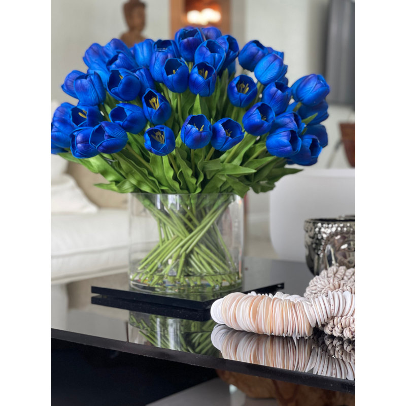 Grand cylindre Rota avec tulipes bleues 