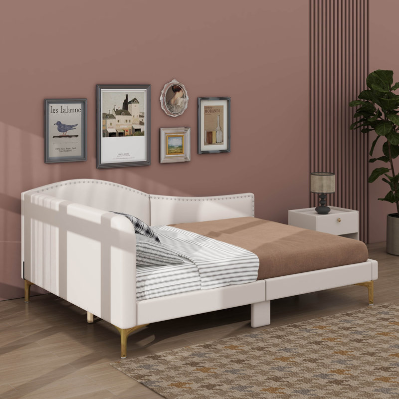 A Luxurious Upholstered Daybed With A Stylish Headboard And Comfortable Armrests, Beige