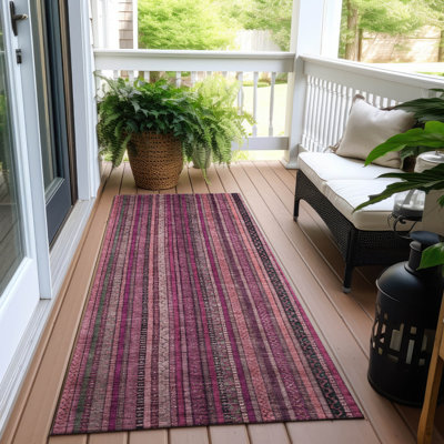 Tapis intérieur / extérieur rose Velatrix