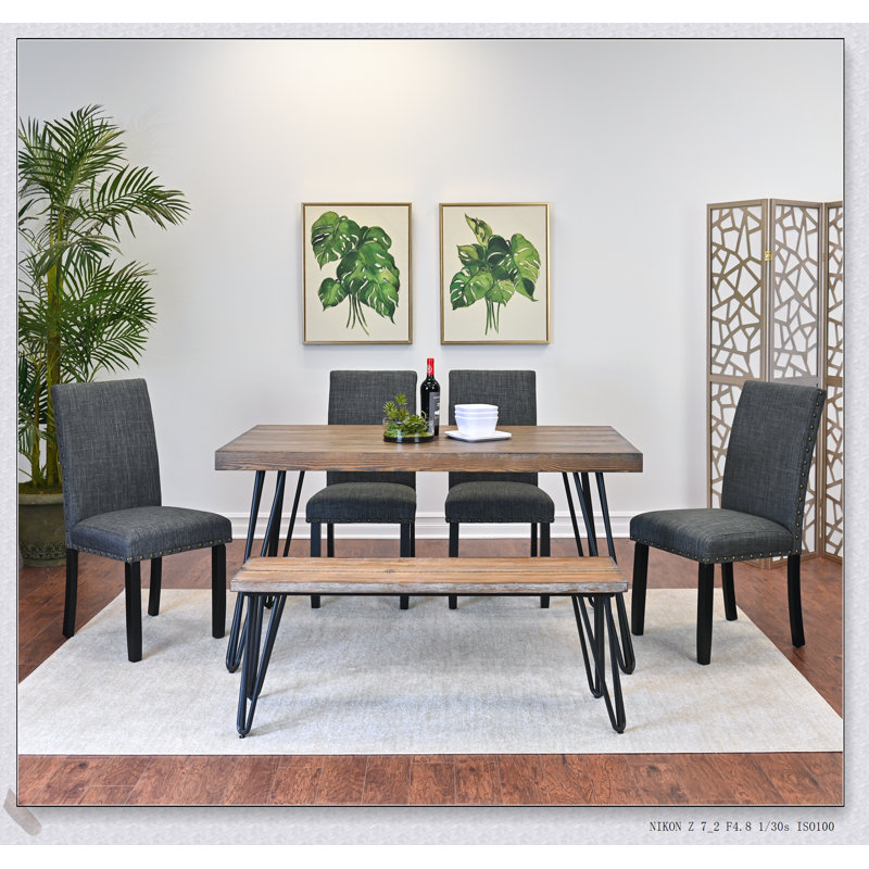 Ensemble de table de salle à manger 6 pièces avec chaises rembourrées confortables, idéal pour les espaces compacts et les intérieurs modernes.