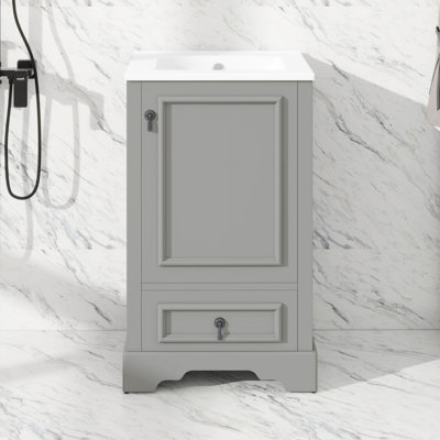 Meuble-lavabo de 20 pouces avec lavabo en céramique, tablette ajustable en U, tiroir à compartiments et porte