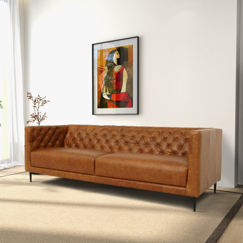 Photo inspiration: 17 Stories Bryceon Mid Century Modern Chesterfield Genuine Leather Sofa Photo Inspiration