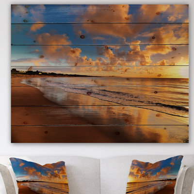 Coucher de soleil coloré sur la plage - reproduction de photo