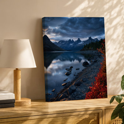 Canvas A Dramatic Mountain Landscape At Twilight Featuring Jagged Peaks Shrouded Wall Art In Dark Ominous Clouds The Scene Is Canvas Wall Art
