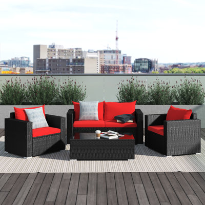 Bakerman Patio 4 Piece Rattan Sofa Seating Group with Cushions by Wade Logan