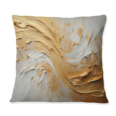 Coussin décoratif doré et beige à motif de vagues abstraites