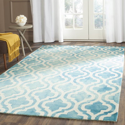 Tapis bleu / ivoire en laine touffeté à la main Adelei
