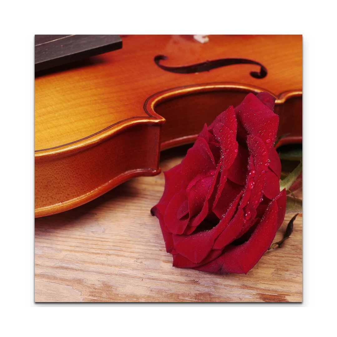 Leinwandbild Violine mit roter Rose