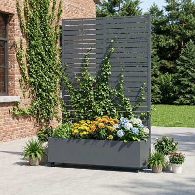 Boîte à fleurs en métal avec treillis et roues