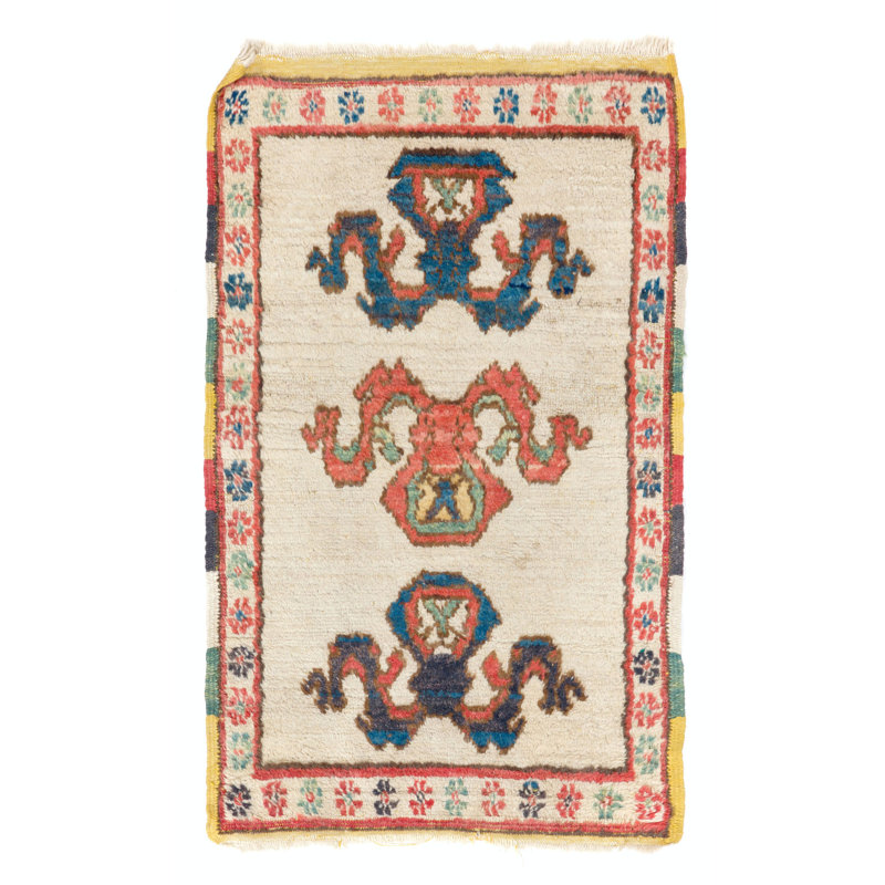 Tapis semi-antique avec bordure colorée. Housse de siège ou tapis de porte. Toute la laine