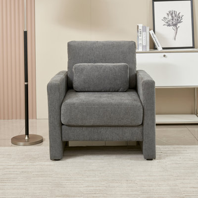 Élégant fauteuil en chenille moderne - fabrication en bois massif offrant une aire de repos confortable dans diverses pièces La base de la chaise rembourrée offre des places assises