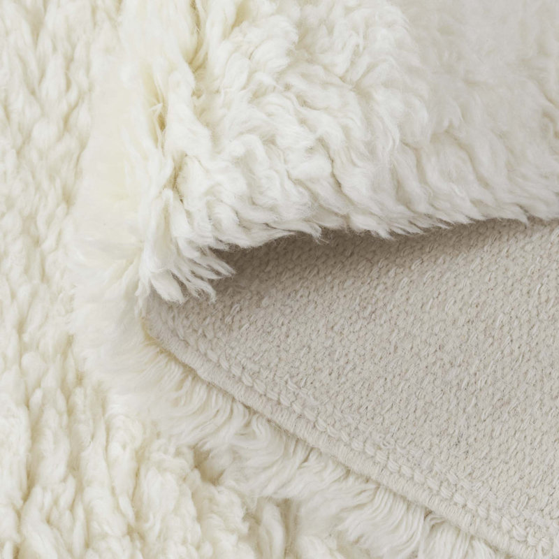 Abriel Solid Color Handmade Wool Area Rug in Ivory, Rectangle 5' x 8'