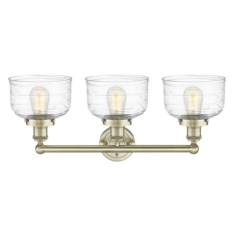 Éclairage pour meuble-lavabo à 3 lumières à intensité variable Raykwan, Laiton antique, Tourbillon déco transparent
