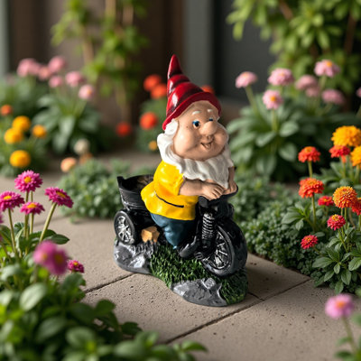Adorable statue de gnome chevauchant un tricycle en résine