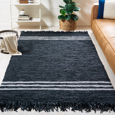 Tapis noir / ivoire en cuir tissé à la main Kyrae