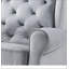 Chaise pivotante grise avec fauteuil oscillant