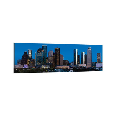 High Rise Buildings In Houston Cityscape Illuminated At Sunset, Houston, Texas by Panoramic Images - Wrapped Canvas Panoramic Gallery-Wrapped Canvas Giclée