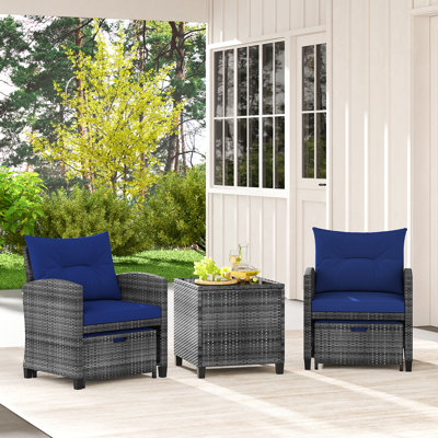5 Piece Patio Rattan Furniture With 2 Ottomans & Tempered Glass Coffee Table by Hokku Designs