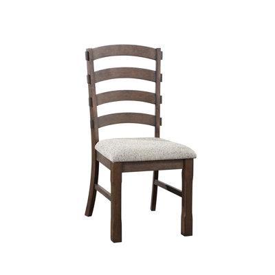 Table confortable rembourrée en tissu gris et chaises de salle à manger rembourrées brun et chêne rustique