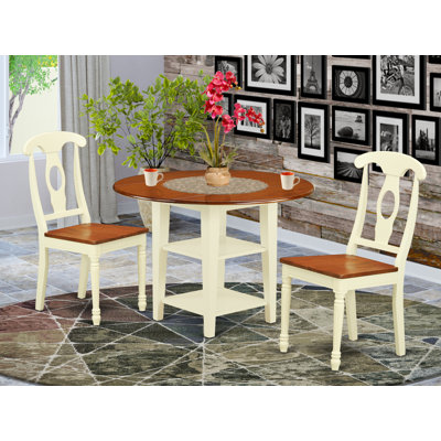 L'ensemble de table de salle à manger 3 pièces pour petits espaces comprend une table de salle à manger ronde avec Dropleaf et des tablettes et 2 chaises en bois, babeurre et cerise