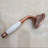 Wall Mounted 8" Rainfall Faucet Shower Head Set with Handheld Sprayer and Tub Spout in Rose Gold Finish