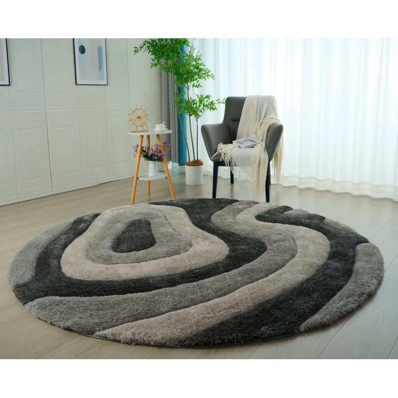 Tapis noir Jakelyn, Rond 7 pi