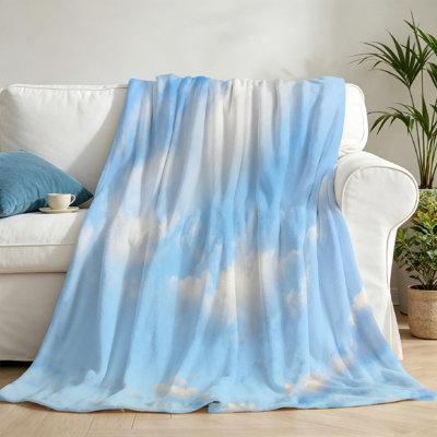 Jeté en molleton bleu flanelle ultra doux, imprimé abstrait recto verso nuages blancs