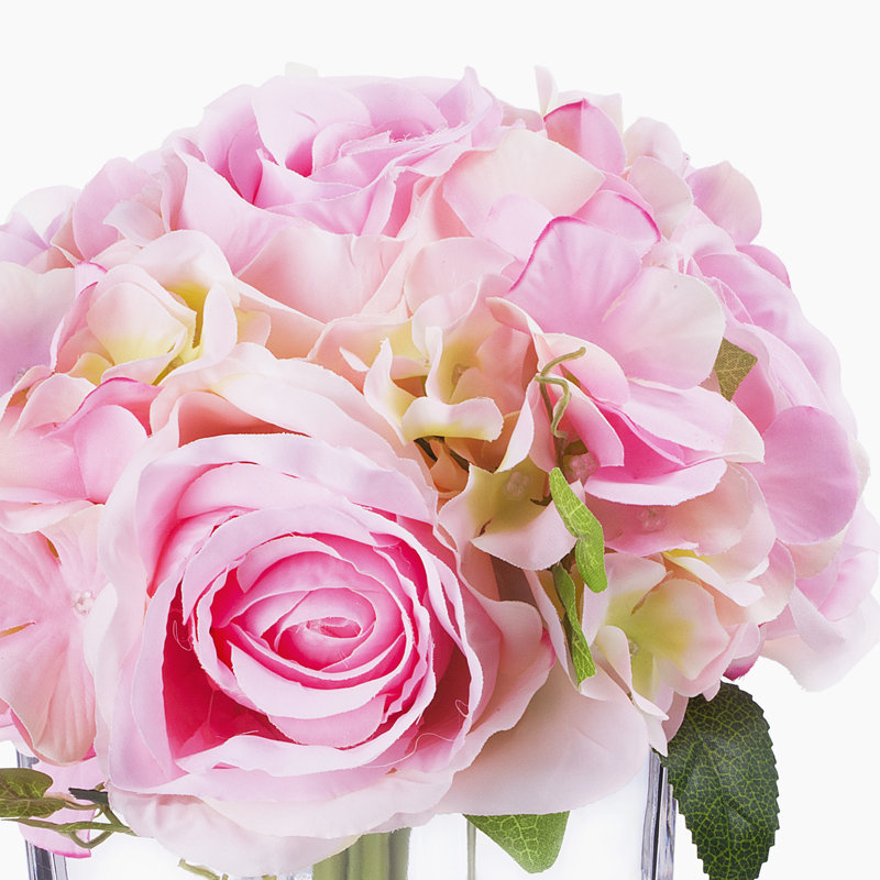 Arrangement d'hortensias dans un vase en verre, Rose