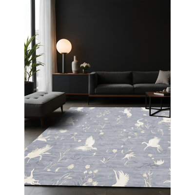 Tapis gris soyeux et moelleux