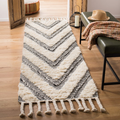 Alimatou Hand Knotted Wool/Cotton Geometric Rug in Black/Beige