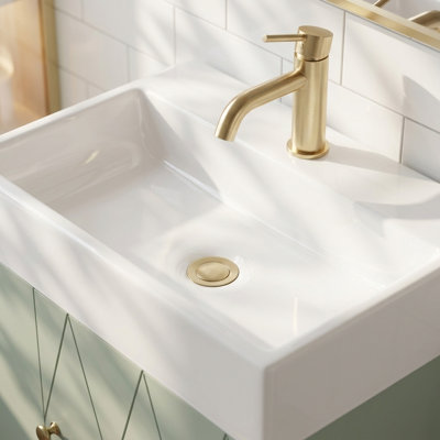 Meuble-lavabo Mavessa de 51 cm avec lavabo en céramique, meuble-lavabo mural moderne pour petits espaces, porte à motif en losanges, poignée dorée, étagères latérales et porte-serviettes.