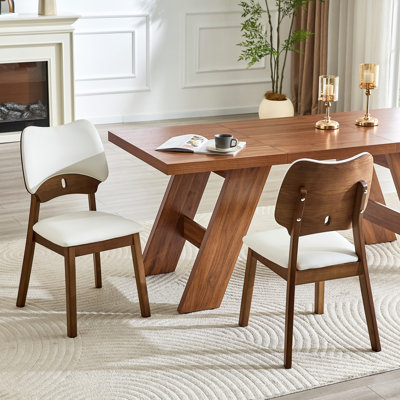 2 chaises de salle à manger en bois massif de couleur noyer, avec emballage souple en polyuréthane blanc sur le dossier et le coussin de siège, dossier évidé, pour les chaises de salle à manger.